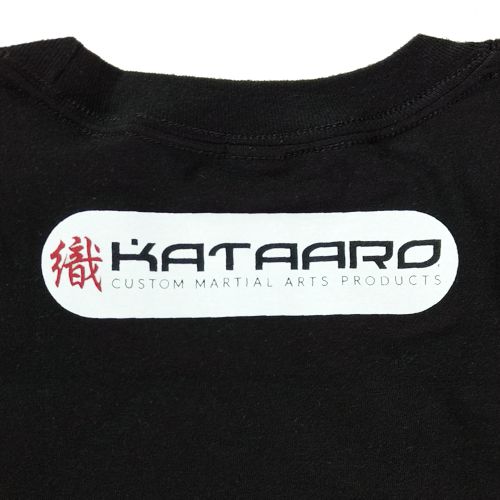 Close-Up of Kataaro Capsule Design Logo Design on Back of Shadow Seal Kataaro Black Tee Shirt