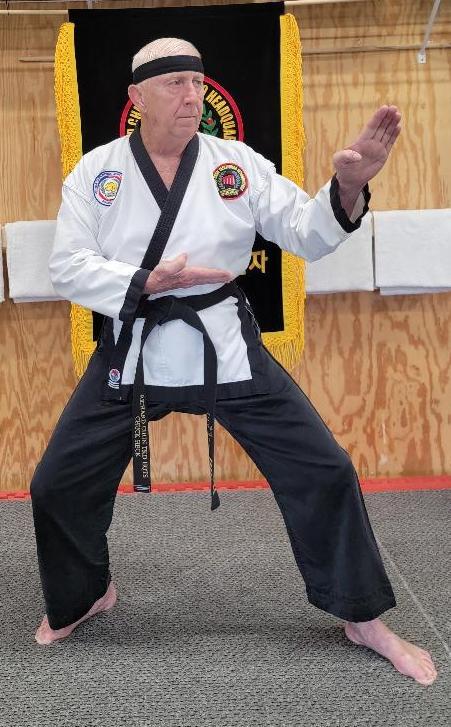 GM Dr. Charles R. Heck, Jr. - Moo Duk Dwan Taekwondo