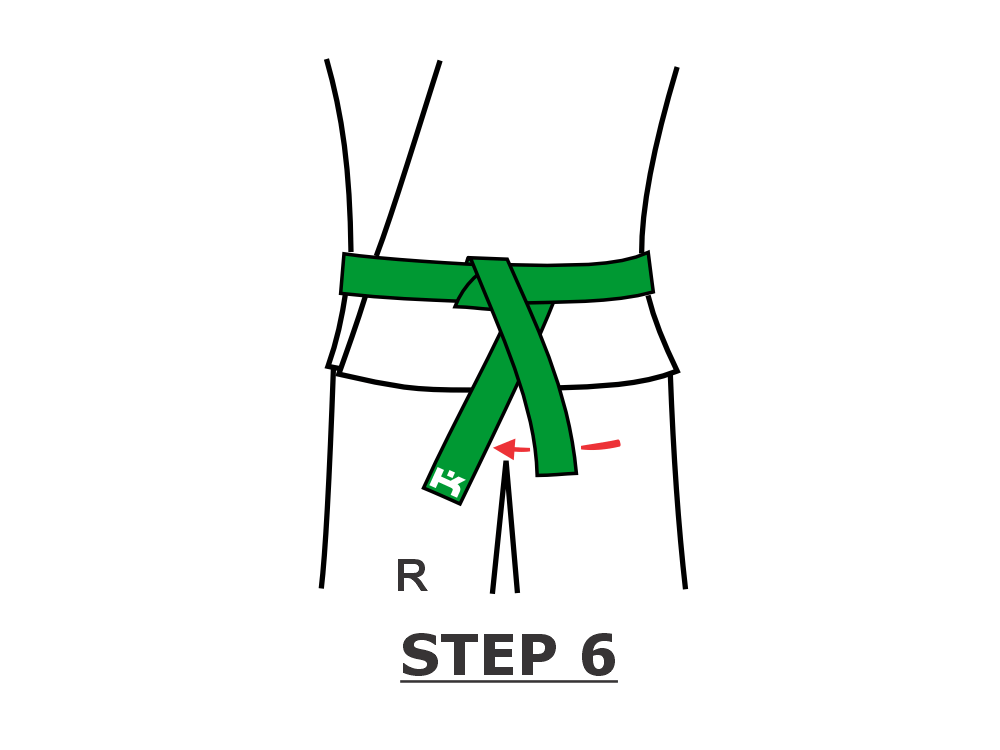 Step 6 - tuck belt end under and across to right leg
